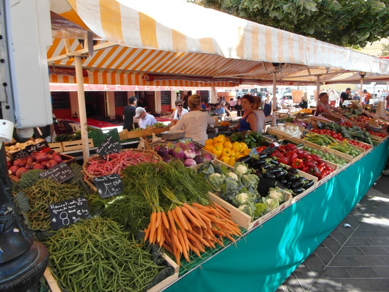 Vegetable stand at the Marche aux Fleurs (Flower Market) of Cours Saleya in Nice