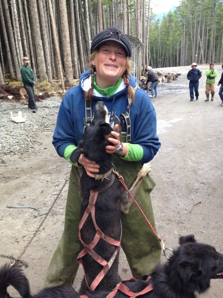 Musher Marian getting a big hug and kiss from one of her fur kids! - Skagway Alaska