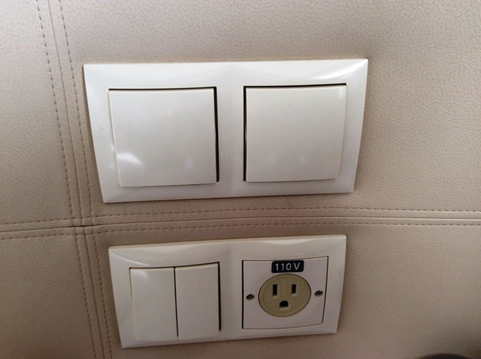 one of several light switches and electrical outlet stations