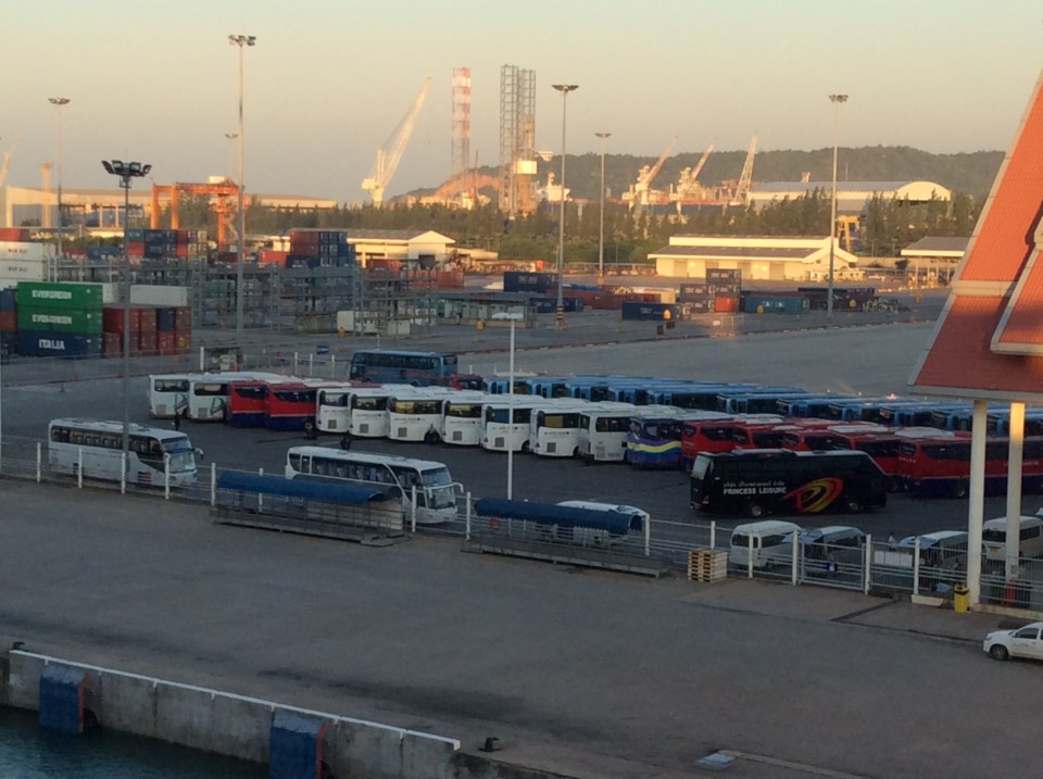 A fleet of buses in container port of Laem Chabang waiting to bus cruise ship passengers to and from Bangkok