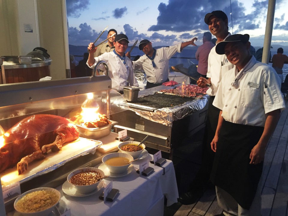 Yacht Cruising the Caribbean in style with Windstar Cruises : Suckling Pig and Lobster Tails highlight an Evening Deck Barbecue under the stars