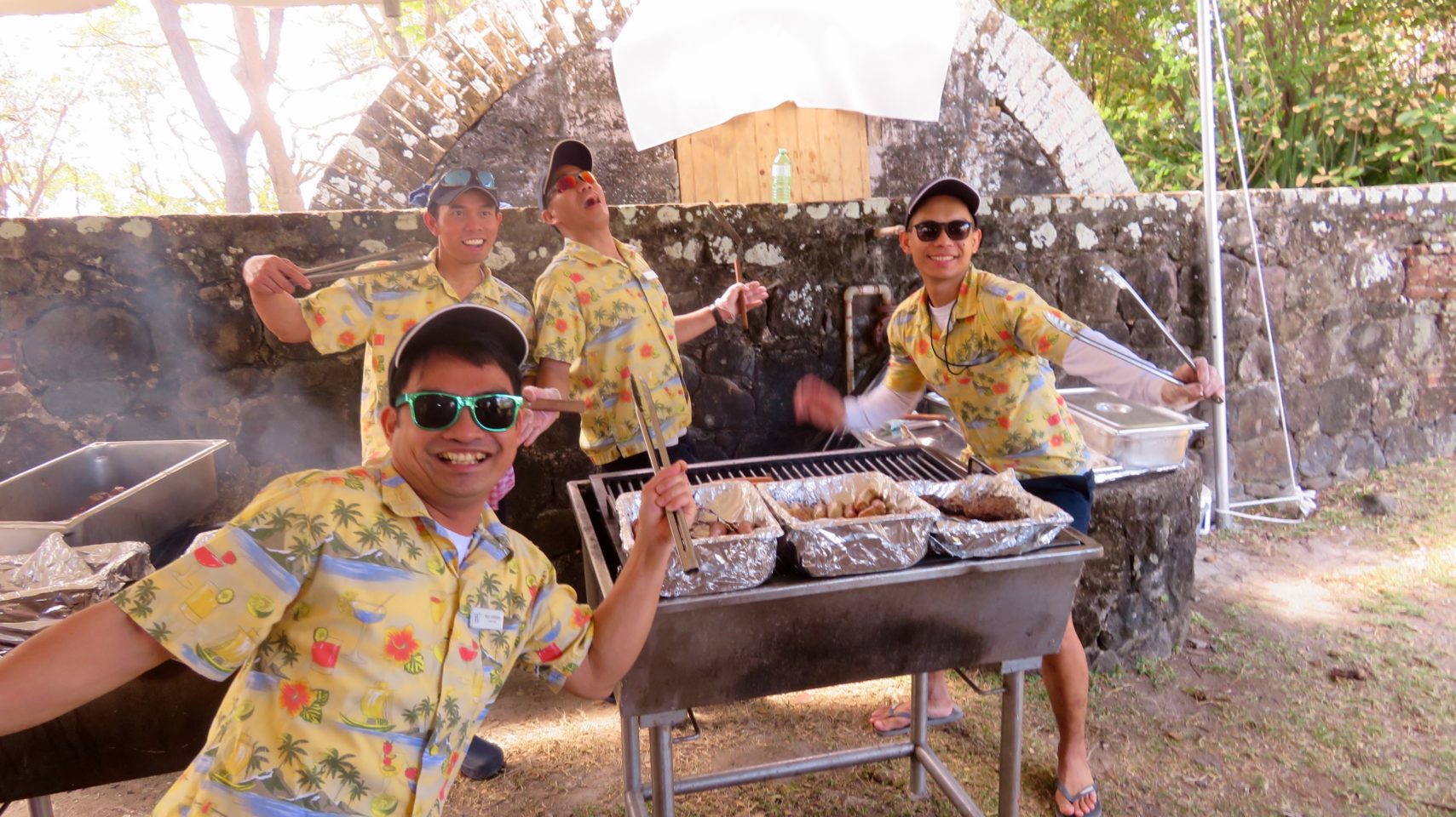 Windstar Cruises ~ my favorite restaurant servers posing with panche at our Island Barbeque, a Windstar tradition