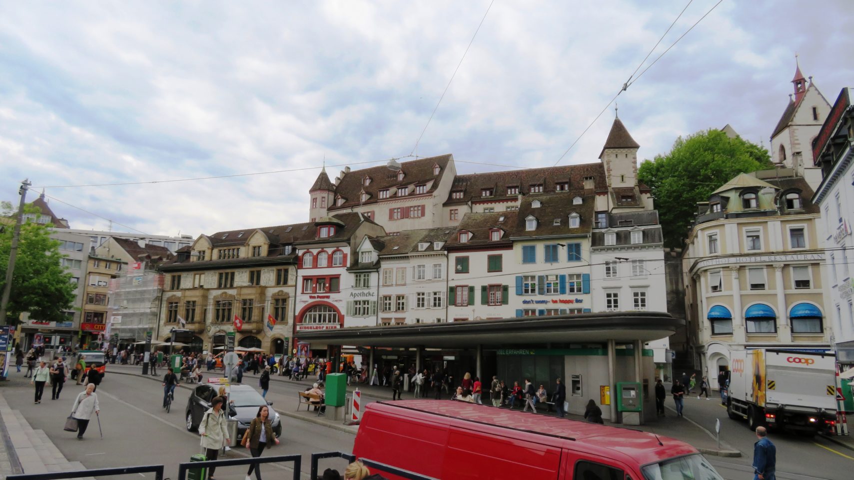 Busy historic BarfusserPlatz in <em><strong>Basel</strong></em>, Switzerland