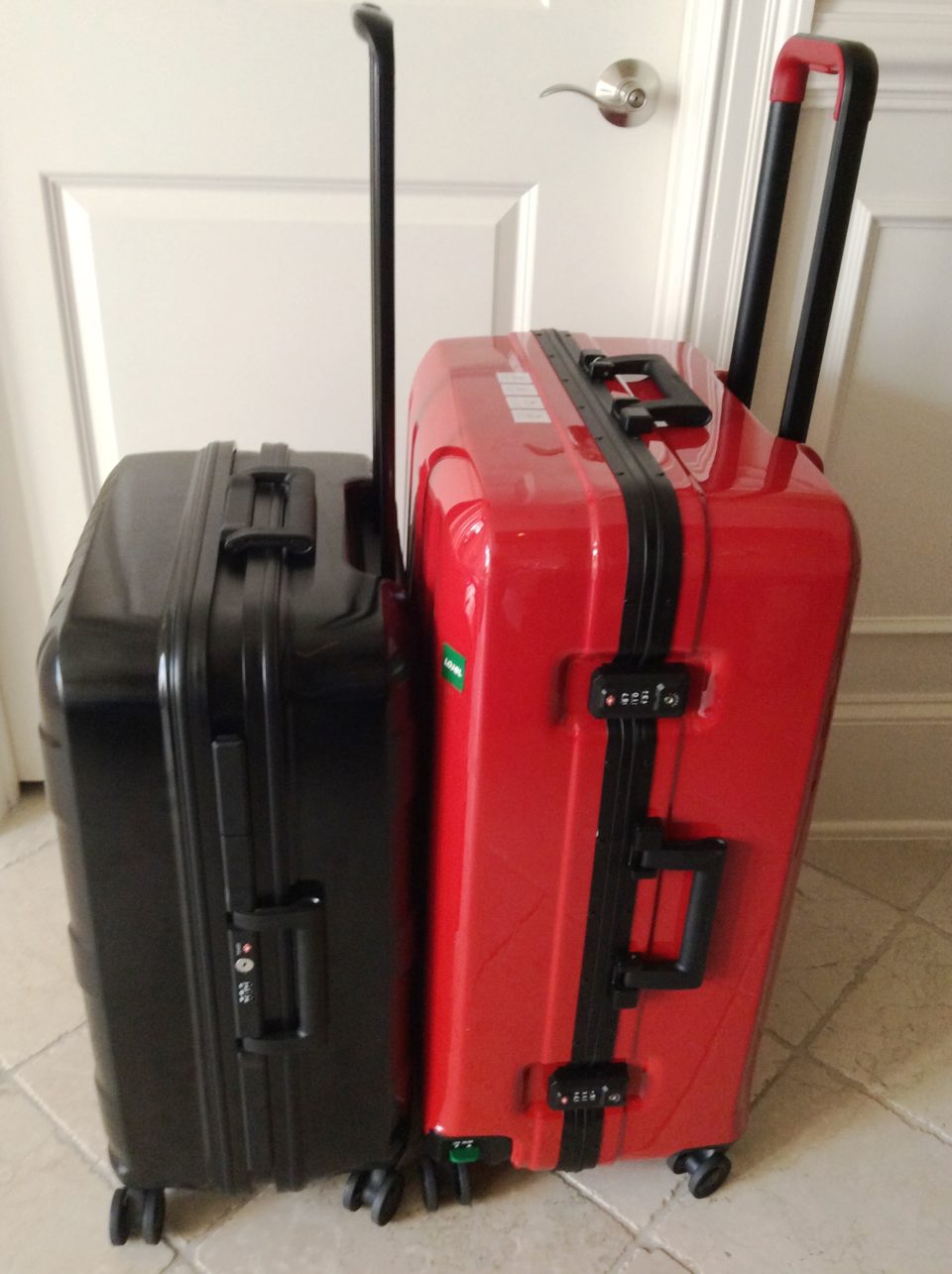 Lojel Luggage ~ The red Novigo and the black Kozmos suitcases